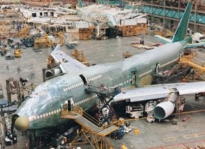 an aircraft being assembled